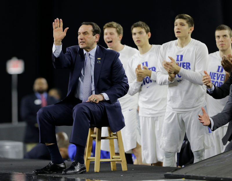 Illustration for article titled Eight Photos Of Coach K Sitting On A Lil' Stool